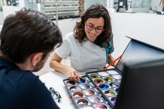 Optometrist Showing Lens Options