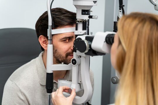 Eye Specialist Adjusting Slitlamp