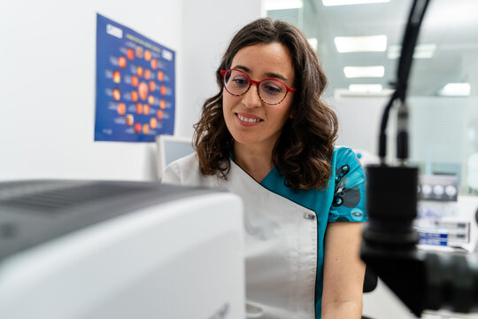 Optometrist Reviewing Monitor
