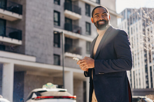 Elegant businessman with a mobile phone