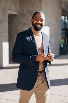 Elegant businessman with a mobile phone