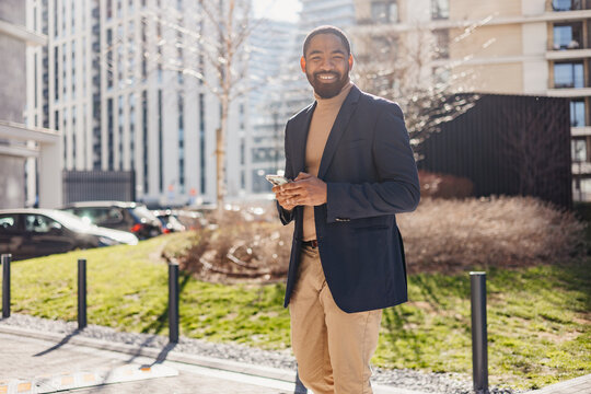 Joyful entrepreneur outdoors