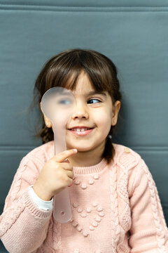 Smiling Child During Eye Test
