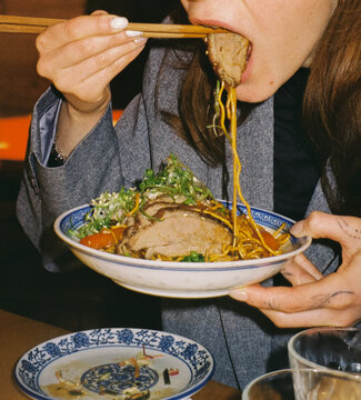 Woman Eating Ramen &ndash; Analog Film Style Close-Up