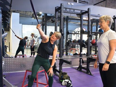 Fitness Training Session at the Gym With Two Women