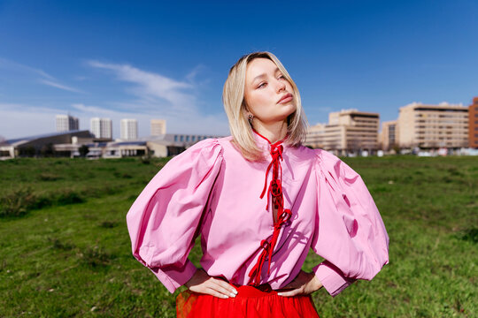 Woman wearing pink puff sleeve blouse 