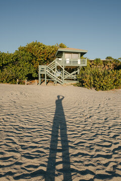 UGC elongated shadow on beach 