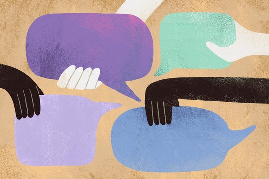 Hands holding thought and speech bubbles