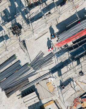 Aerial View of Construction Site Workers and Steel Rebar