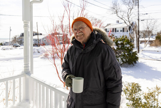 Confident Senior man  portrait Porch house