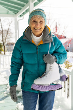 Senior woman  portrait with Ice skates