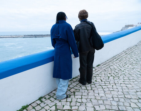 Two women checking the sea view 