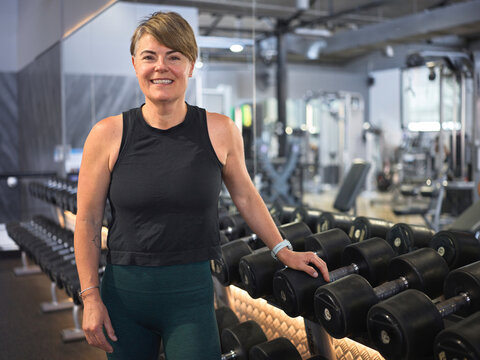 Portrait of Personal Trainer in gym setting