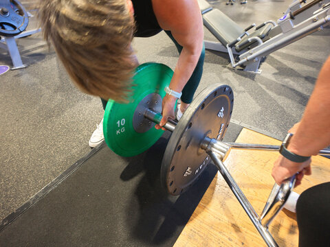 Weightlifting Session at Gym With Personal Trainer