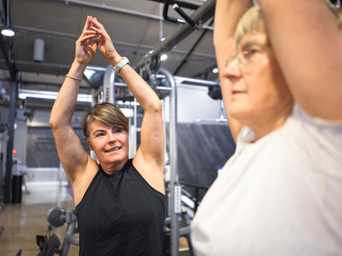 Person trainer during instruction at gym