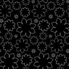 Fototapeta premium Repeating design shows white line art flowers of different sizes. Some have distinct petals, others are wavy circles. They stand out against the dark black background.