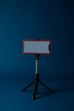 a phone ready for recording on a tripod