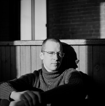 Portrait of a man in the sunlight.
