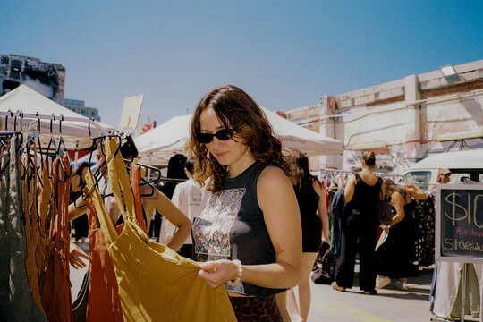 Woman on an urban flea market on the sunny weekend in Melbourne 