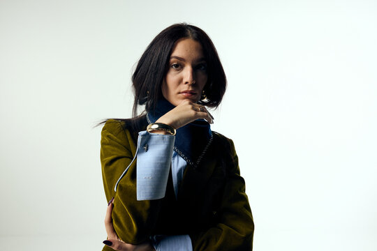 Beautiful woman facing the camera in studio