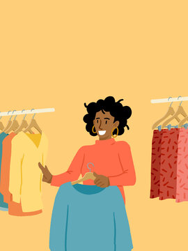Woman choosing new clothes enjoying retail shopping concept