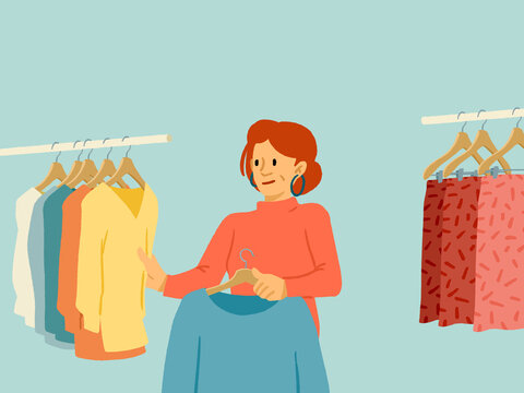 Woman choosing clothes on a rack in a retail store