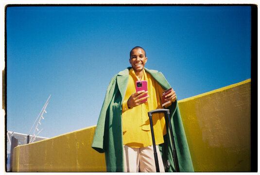 Traveler Holding Passport and Phone