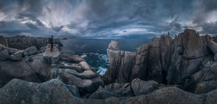 Hiker Above Atlantic Cliffs