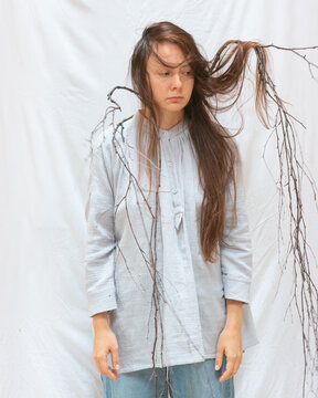 surreal portrait with tree branch 10