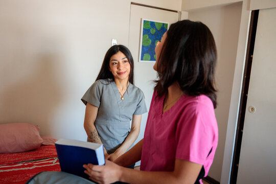 Female Students Getting Ready for Class