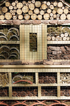 Insect Hotel Filled With Natural Materials in a Garden During Daytime