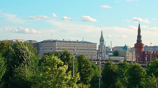 Horizontal panning of Moscow Kremlin, Bolshoy Moskvoretskiy bridge and Christ the Saviour Cathedral during summer sunny day. Landmarks in Moscow, Russia. View from the Floating bridge