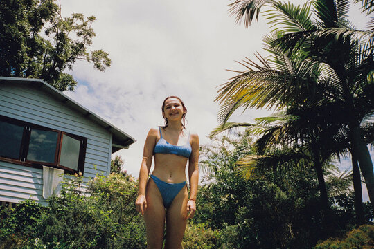 Candid summer snapshot with woman in bikini in Australia  
