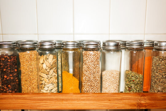 Organized Spice Jars Kitchen Shelf. Flash food