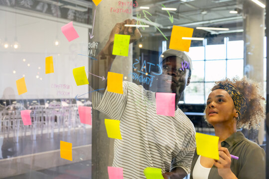 Creative brainstorming session with colorful sticky notes