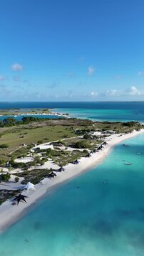Vertical Drone Climb Above the Turquoise Lagoons and Cays of Los Roques