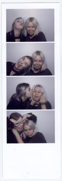 Instant Film Photo Booth Strip of Two Friends Making Faces