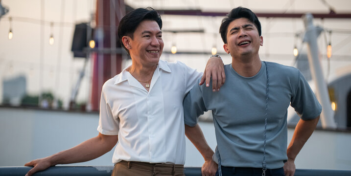 Couple laughing enjoying urban outdoor moment together in Thailand