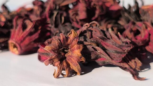 Dried rosella flowers with deep red tones, known for their natural health benefits, rich in antioxidants and commonly used to support immunity and overall wellness.