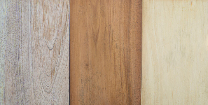 background of three wooden planks in different colors