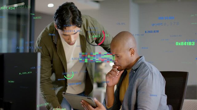 Vertical video: Pointing man in olive shirt explaining charts at desk, seated man scrolling tablet