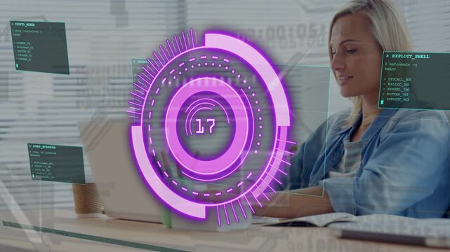Woman typing at desk purple HUD appearing and updating values while monitoring tech performance