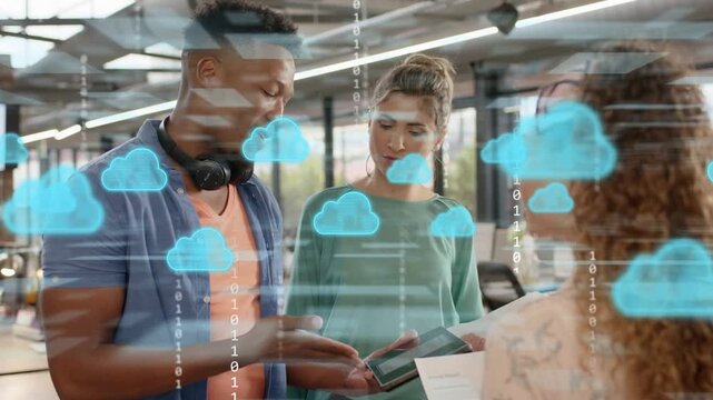 Man showing tablet to team working, starting tech cloud overlay growing covering then diminishing