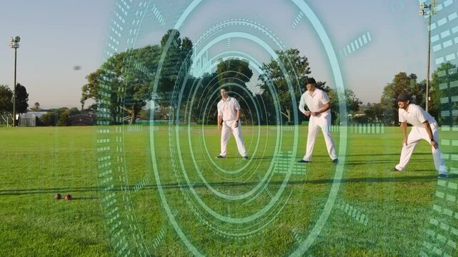 Four cricketers playing with bowler running in batter swinging bat fielder picking ball under HUD