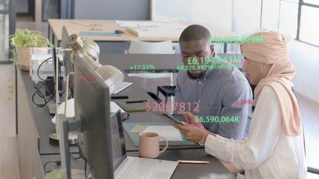 Woman adjusting tablet toward man, man pointing, thinking while financial overlays showing numbers