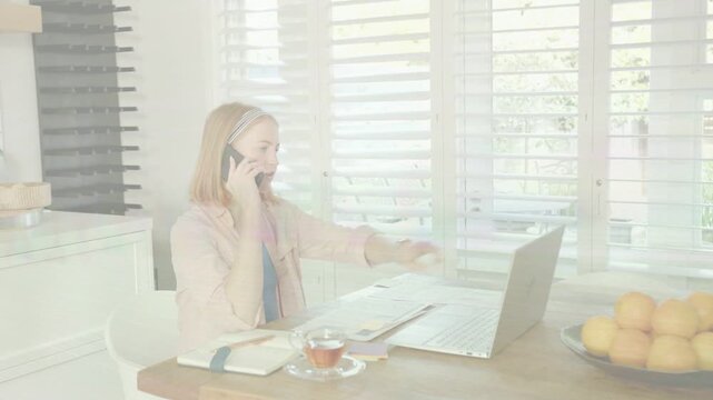 Receiving call, woman juggling smartphone, typing laptop, reading papers for business