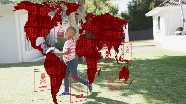 Boy playing with soccer ball moving across yard, red map overlay showing malware virus warnings