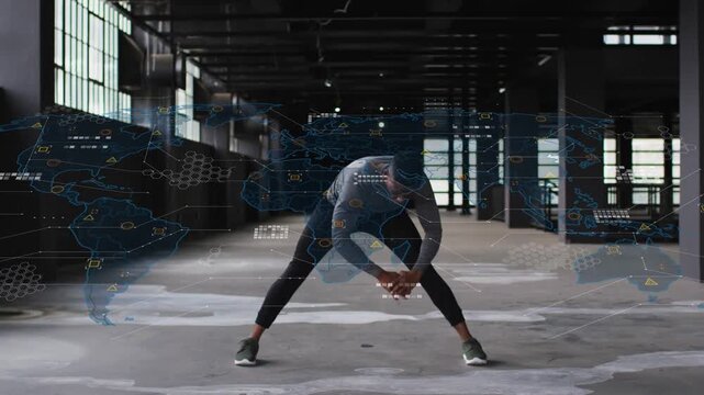 Vertical video: Male starting stretch in loft, HUD map fading over him, warming up for fitness