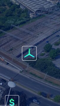 Vertical video: Teal icon fading in causing icons rising and stacking over aerial map showing data