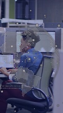 Vertical video: Female coder typing on laptop, activating dotted globe overlay marking code for QA